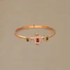 Elegant Glow Gold Gatti Bangle Bracelet