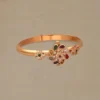 Graceful Navaratna Blossom Gold Bracelet